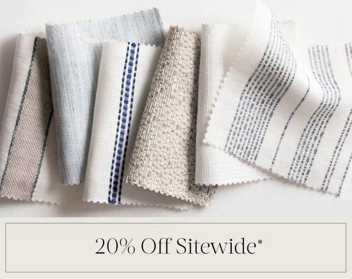 20% Off Sitewide in black text over an image of various colored material swatches with stripes.