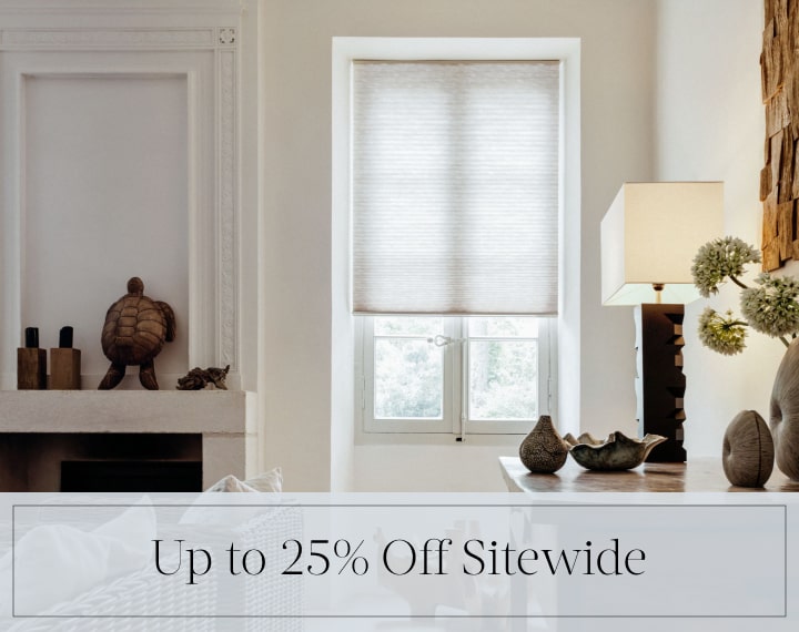 Up to 25% Off Sitewide in black text over an image of a window with light filtering Cellular Shades.
