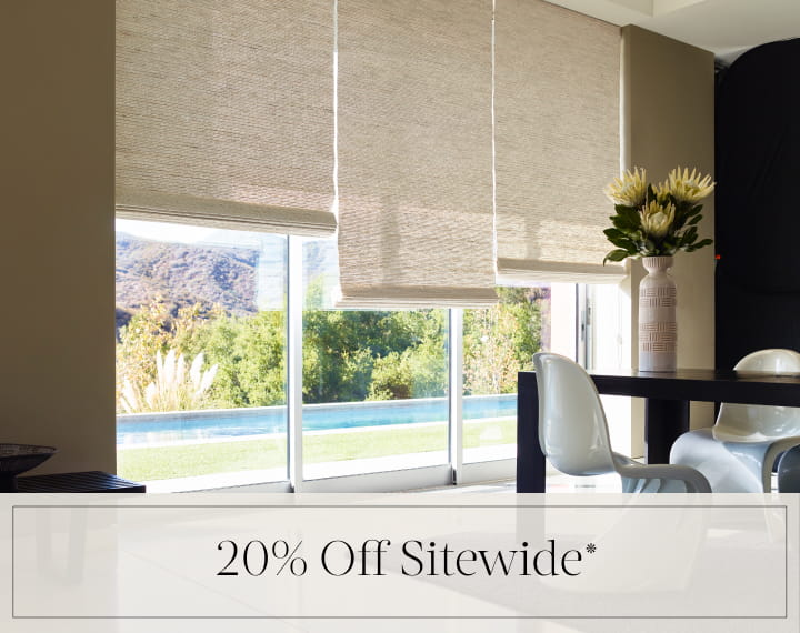 20% Off Sitewide in black text over an image of a room with glass doors with Woven Wood Shades.