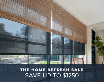 Floor to ceiling windows featuring waterfall woven wood shades layered over solar shades in a seasonal room with promo text